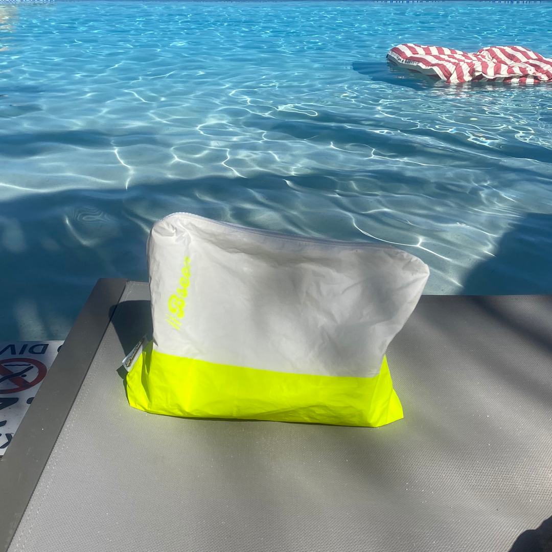 Brashies Cable Beach wet bag on towel with swimwear inside